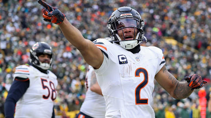 Chicago Bears wide receiver DJ Moore gestures to the crowd after scoring a touchdown against the Green Bay Packers. Chicago Bears wide receiver DJ Moore gestures to the crowd after scoring a touchdown against the Green Bay Packers.