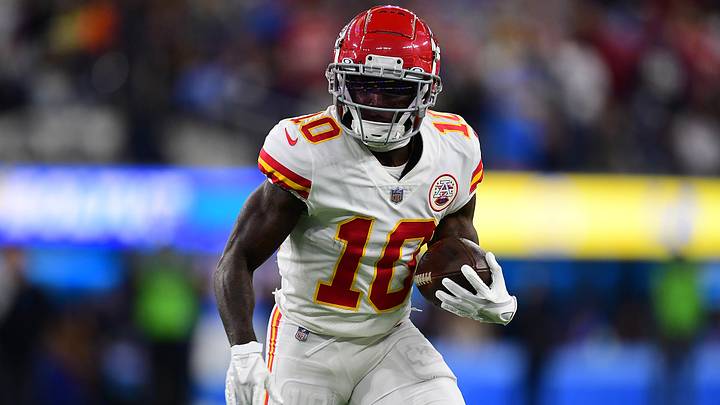 Dec 16, 2021; Inglewood, California, USA; Kansas City Chiefs wide receiver Tyreek Hill (10) runs the ball against the Los Angeles Chargers during the first half at SoFi Stadium. Mandatory Credit: Gary A. Vasquez-USA TODAY Sports Dec 16, 2021; Inglewood, California, USA; Kansas City Chiefs wide receiver Tyreek Hill (10) runs the ball against the Los Angeles Chargers during the first half at SoFi Stadium. Mandatory Credit: Gary A. Vasquez-USA TODAY Sports