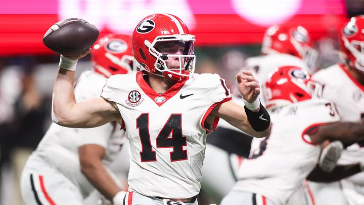 Dec 6, 2025; Atlanta, GA, USA; Georgia Bulldogs quarterback Gunner Stockton (14) throws a pass during the fourth quarter against the Alabama Crimson Tide during the 2025 SEC Championship game at Mercedes-Benz Stadium. Mandatory Credit: Brett Davis-Imagn Images