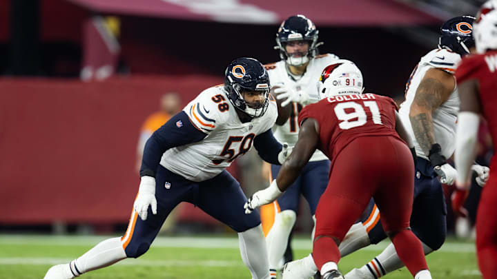 Chicago Bears offensive tackle Darnell Wright (58) protects quarterback Caleb Williams