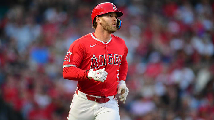 August 16, 2024; Anaheim, California, USA; Los Angeles Angels left fielder Taylor Ward (3) runs after hitting a single against the Atlanta Braves during the third inning at Angel Stadium