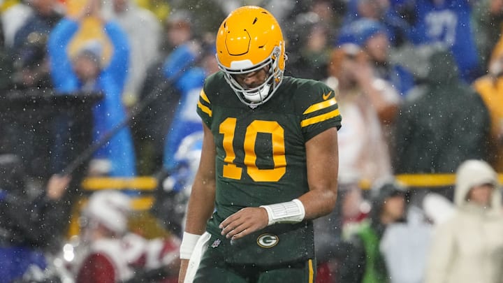Nov 3, 2024; Green Bay, Wisconsin, USA;  Green Bay Packers quarterback Jordan Love (10) hangs his head after throwing an interception during the second quarter against the Detroit Lions at Lambeau Field.
