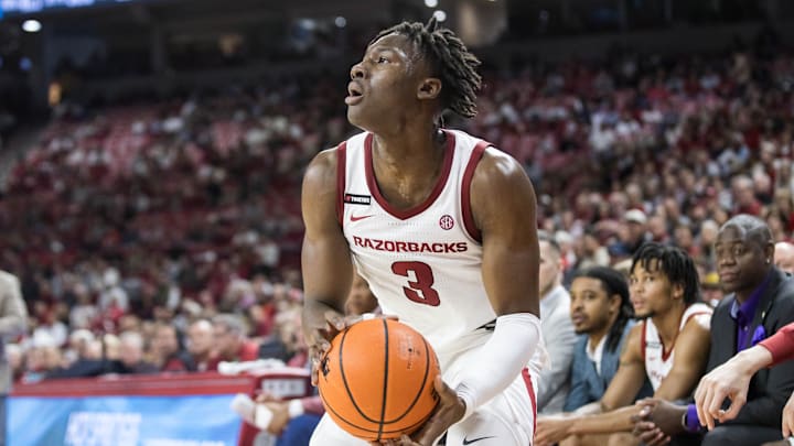 Dec 7, 2024; Fayetteville, Arkansas, USA;  Arkansas Razorbacks forward Adou Thiero (3) gets ready to shoot the ball during the second half against the Texas-San Antonio Roadrunners at Bud Walton Arena. Arkansas won 75-60. Mandatory Credit: Brett Rojo-Imagn Images