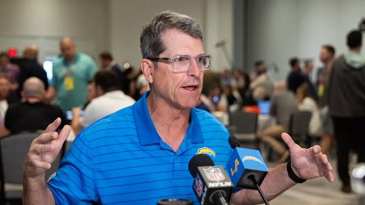 Mar 31, 2026; Phoenix, AZ, USA; Los Angeles Chargers head coach Jim Harbaugh speaks to reporters in the media during the 2026 NFL Annual League Meeting at the Arizona Biltmore. Mandatory Credit: Mark J. Rebilas-Imagn Images