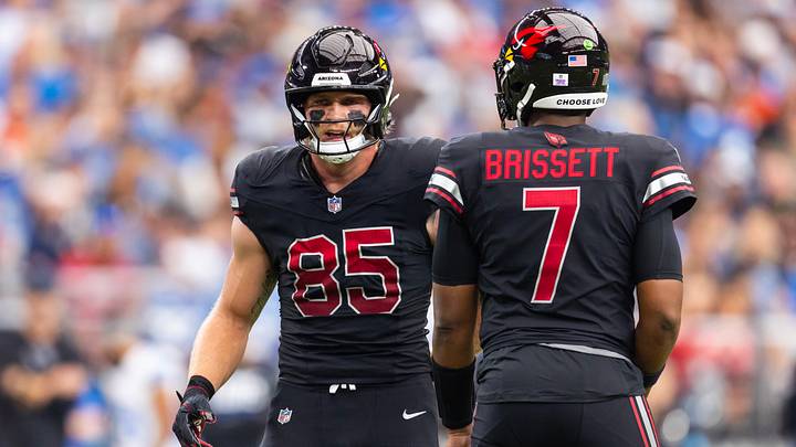 Oct 11, 2026; Glendale, Arizona, USA; Arizona Cardinals tight end Trey McBride (85) with quarterback Jacoby Brissett (7) against the Detroit Lions at State Farm Stadium. Oct 11, 2026; Glendale, Arizona, USA; Arizona Cardinals tight end Trey McBride (85) with quarterback Jacoby Brissett (7) against the Detroit Lions at State Farm Stadium.
