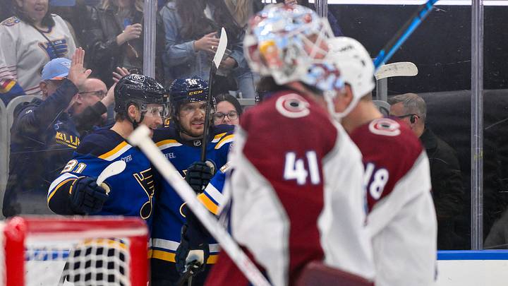 Apr 7, 2026; St. Louis, Missouri, USA; St. Louis Blues center Robert Thomas (18) is congratulated by left wing Dylan Holloway (81) after scoring against the Colorado Avalanche during the second period at Enterprise Center. Mandatory Credit: Jeff Curry-Imagn Images