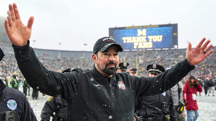 Ohio State head coach Ryan Day waves at fans to celebrate 27-9 win over Michigan at Michigan Stadium in Ann Arbor on Saturday, Nov. 29, 2025.