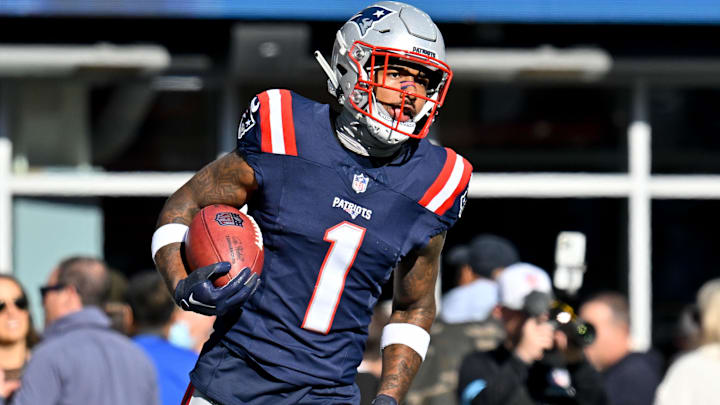 Nov 17, 2024; Foxborough, Massachusetts, USA; New England Patriots wide receiver Ja'Lynn Polk (1) warms up before a game against the Los Angeles Rams at Gillette Stadium. Mandatory Credit: Eric Canha-Imagn Images