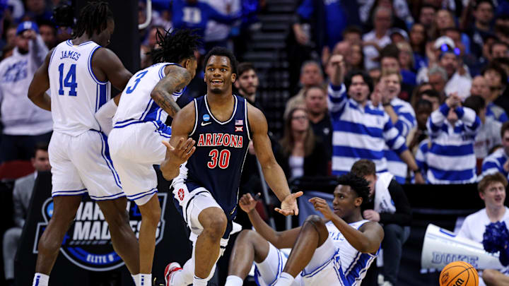 Mar 27, 2025; Newark, NJ, USA; Arizona Wildcats forward Tobe Awaka (30) reacts after  a play during the first half against the Duke Blue Devils during an East Regional semifinal of the 2025 NCAA tournament at Prudential Center. Mandatory Credit: Vincent Carchietta-Imagn Images