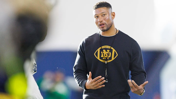 Notre Dame head coach Marcus Freeman greets his players during a Notre Dame football spring practice at Irish Athletic Center on Wednesday, March 19, 2025, in South Bend.