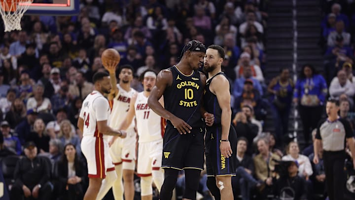 Jan 19, 2026; San Francisco, California, USA; Golden State Warriors forward Jimmy Butler III (10) and guard Stephen Curry (30) react after Butler misses a shot at the buzzer during the first quarter against the Miami Heat at Chase Center. Mandatory Credit: Kelley L Cox-Imagn Images