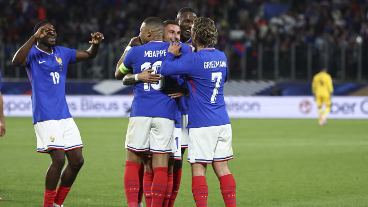Jonathan Clauss, Kylian Mbappe, Antoine Griezmann