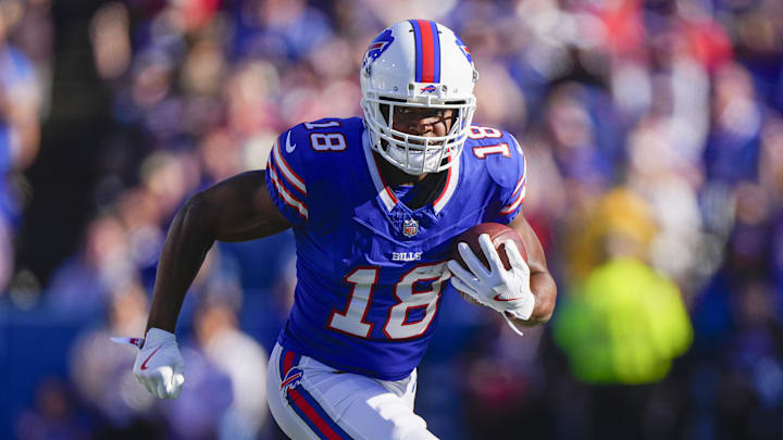 Oct 20, 2024; Orchard Park, New York, USA; Buffalo Bills wide receiver Amari Cooper (18) runs with the ball after making a catch against the Tennessee Titans during the second half at Highmark Stadium. Mandatory Credit: Gregory Fisher-Imagn Images