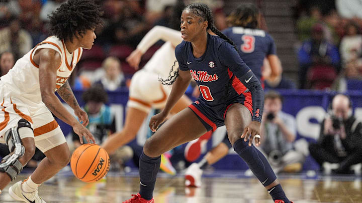 Mar 7, 2025; Greenville, SC, USA; Ole Miss Rebels guard Sira Thienou (0) on defense against Texas Longhorns guard Rori Harmon (3) during the first half at Bon Secours Wellness Arena. Mandatory Credit: Jim Dedmon-Imagn Images