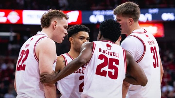 Wisconsin Badgers huddle during the first half of their Big Ten conference game against No.5 Purdue at the Kohl Center.