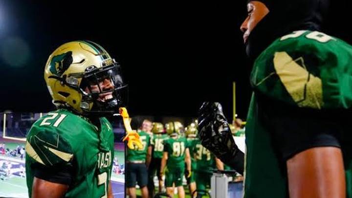 Basha defensive backs Jayden Jamerson (21) and Ahmad Jones (34) celebrate their interceptions against Liberty during a game at Basha High School in Chandler on Sept. 18, 2026. Basha defensive backs Jayden Jamerson (21) and Ahmad Jones (34) celebrate their interceptions against Liberty during a game at Basha High School in Chandler on Sept. 18, 2026.