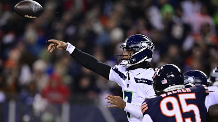 Geno Smith (7) passes the ball against the Bears defense in the first half at Soldier Field Thursday night. Geno Smith (7) passes the ball against the Bears defense in the first half at Soldier Field Thursday night.