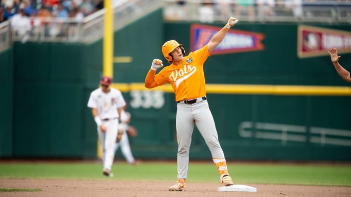 UNCROPPED POSTER OPTION Tennessee's Billy Amick (11) strikes a celebratory pose during a NCAA College World Series game between Tennessee and Florida State at Charles Schwab Field in Omaha, Neb., on Wednesday, June 19, 2024.