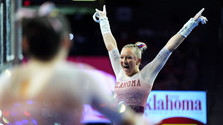 Oklahoma's Ella Murphy celebrates after the bars during the SEC Women's gymnastics meet between the University of Oklahoma Sooners and the Alabama Crimson Tide at the Lloyd Noble Center in Norman, Okla., Friday Feb. 6, 2026. Oklahoma's Ella Murphy celebrates after the bars during the SEC Women's gymnastics meet between the University of Oklahoma Sooners and the Alabama Crimson Tide at the Lloyd Noble Center in Norman, Okla., Friday Feb. 6, 2026.
