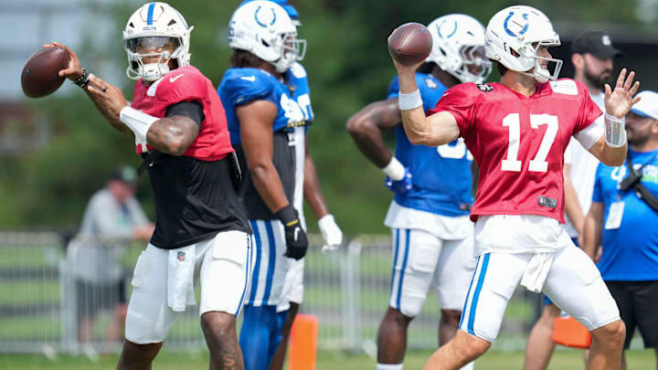 Indianapolis Colts quarterback Anthony Richardson Sr. (5) and quarterback Daniel Jones (17) throw the ball Thursday, Aug. 14, 2025, at a joint practice with the Green Bay Packers during training camp at Grand Park in Westfield.