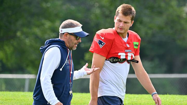 Jul 28, 2026; Foxborough, MA, USA; New England Patriots offensive coordinator Josh McDaniels and quarterback Drake Maye (10) speak as they walk to practice for training camp at Gillette Stadium. Mandatory Credit: Eric Canha-Imagn Images Jul 28, 2026; Foxborough, MA, USA; New England Patriots offensive coordinator Josh McDaniels and quarterback Drake Maye (10) speak as they walk to practice for training camp at Gillette Stadium. Mandatory Credit: Eric Canha-Imagn Images