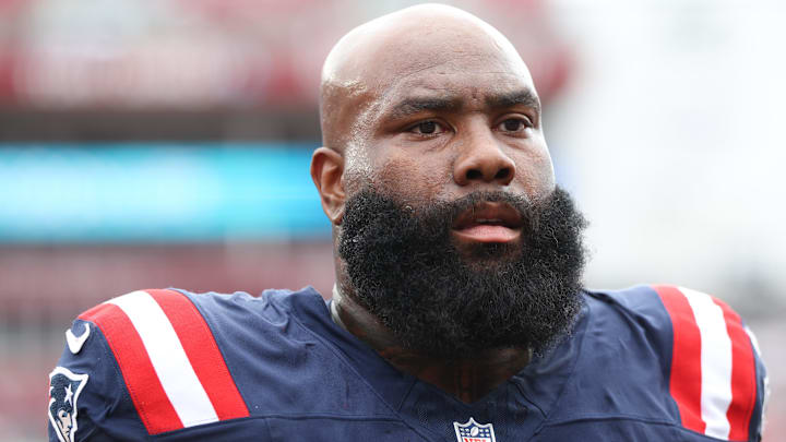 Nov 9, 2025; Tampa, Florida, USA; New England Patriots offensive tackle Morgan Moses (76) warms up before a game against the Tampa Bay Buccaneers at Raymond James Stadium. Mandatory Credit: Nathan Ray Seebeck-Imagn Images