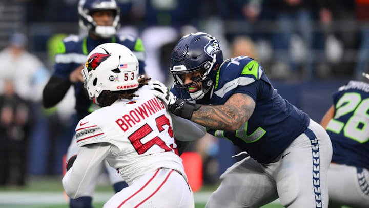Nov 24, 2024; Seattle, Washington, USA; Seattle Seahawks offensive tackle Abraham Lucas (72) blocks Arizona Cardinals linebacker Baron Browning (53) during the second half at Lumen Field. Mandatory Credit: Steven Bisig-Imagn Images