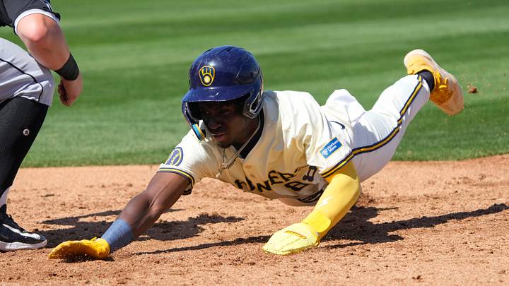 Mar 13, 2024; Phoenix, Arizona, USA; Milwaukee Brewers Luis Lara (88) dives back into first base against the Chicago White Sox in the second inning at American Family Fields of Phoenix. Mandatory Credit: Rick Scuteri-USA TODAY Sports Mar 13, 2024; Phoenix, Arizona, USA; Milwaukee Brewers Luis Lara (88) dives back into first base against the Chicago White Sox in the second inning at American Family Fields of Phoenix. Mandatory Credit: Rick Scuteri-USA TODAY Sports