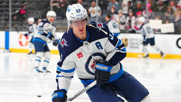 Winnipeg Jets center Mark Scheifele (55) warms up before the start of a game against the Vegas Golden Knights at T-Mobile Arena. Mandatory Credit: Stephen R. Sylvanie-Imagn Images
