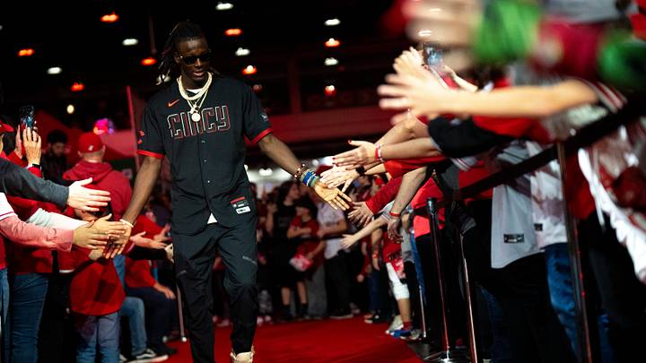 Cincinnati Reds third baseman Elly De La Cruz (44) greets fans during the Cincinnati Reds Redsfest at Duke Energy Convention Center in Cincinnati on Friday, Dec. 1, 2023. Cincinnati Reds third baseman Elly De La Cruz (44) greets fans during the Cincinnati Reds Redsfest at Duke Energy Convention Center in Cincinnati on Friday, Dec. 1, 2023.
