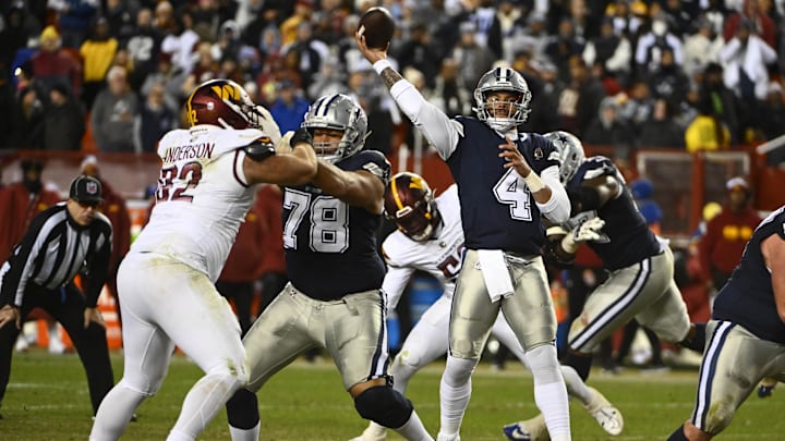 Dallas Cowboys quarterback Dak Prescott attempts a pass against the Washington Commanders.