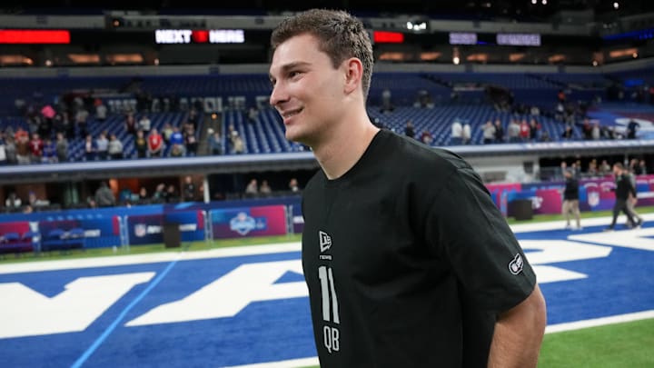 Feb 28, 2026; Indianapolis, IN, USA; Indiana quarterback Fernando Mendoza (QB11) looks on during the NFL Scouting Combine at Lucas Oil Stadium. Mandatory Credit: Kirby Lee-Imagn Images
