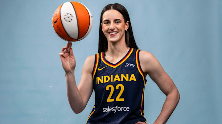 Indiana Fever guard Caitlin Clark poses for a photo during media day at Gainbridge Fieldhouse in Indianapolis.