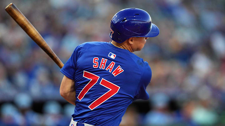 Mar 5, 2024; Surprise, Arizona, USA; Chicago Cubs third  baseman Matt Shaw (77) bats against the Kansas City Royals during the second inning at Surprise Stadium