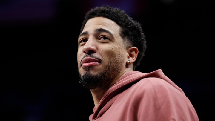 Indiana Pacers guard Tyrese Haliburton (0) on the sidelines against the Detroit Pistons.