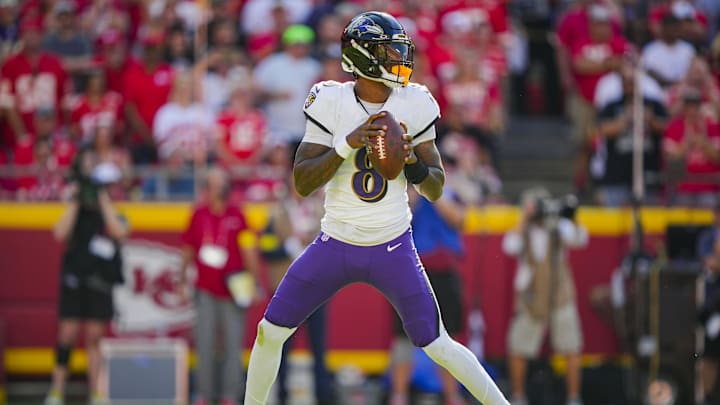 Sep 28, 2025; Kansas City, Missouri, USA; Baltimore Ravens quarterback Lamar Jackson (8) drops back to pass during the first half against the Kansas City Chiefs at GEHA Field at Arrowhead Stadium. Mandatory Credit: Jay Biggerstaff-Imagn Images Sep 28, 2025; Kansas City, Missouri, USA; Baltimore Ravens quarterback Lamar Jackson (8) drops back to pass during the first half against the Kansas City Chiefs at GEHA Field at Arrowhead Stadium. Mandatory Credit: Jay Biggerstaff-Imagn Images