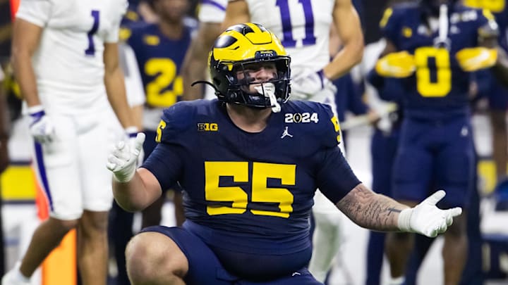 Jan 8, 2024; Houston, TX, USA; Michigan Wolverines defensive lineman Mason Graham (55) against the Washington Huskies during the 2024 College Football Playoff national championship game at NRG Stadium. Mandatory Credit: Mark J. Rebilas-Imagn Images