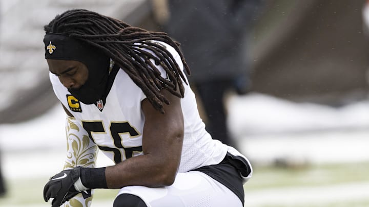 Dec 24, 2022; Cleveland, Ohio, USA; New Orleans Saints linebacker Demario Davis (56) kneels during warm ups before the game against the Cleveland Browns at FirstEnergy Stadium. Mandatory Credit: Scott Galvin-Imagn Images
