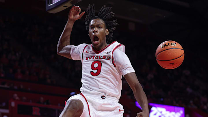 Rutgers Scarlet Knights forward Dylan Grant (9) goes up for a dunk