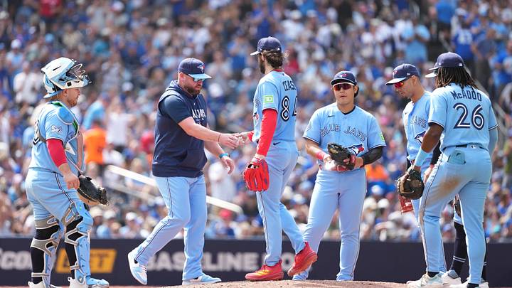 Aug 16, 2026; Toronto, Ontario, CAN; Toronto Blue Jays starting pitcher Dylan Cease (84) is relieved by manager John Schneider (14) against the New York Yankees during the seventh inning at Rogers Centre. Mandatory Credit: Nick Turchiaro-Imagn Images Aug 16, 2026; Toronto, Ontario, CAN; Toronto Blue Jays starting pitcher Dylan Cease (84) is relieved by manager John Schneider (14) against the New York Yankees during the seventh inning at Rogers Centre. Mandatory Credit: Nick Turchiaro-Imagn Images
