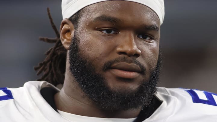 Aug 26, 2023; Arlington, Texas, USA; Dallas Cowboys defensive tackle Mazi Smith (58) on the sidelines during the game against the Las Vegas Raiders at AT&T Stadium. Aug 26, 2023; Arlington, Texas, USA; Dallas Cowboys defensive tackle Mazi Smith (58) on the sidelines during the game against the Las Vegas Raiders at AT&T Stadium.