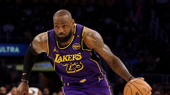 Feb 28, 2025; Los Angeles, California, USA; Los Angeles Lakers forward LeBron James (23) drives during the fourth quarter against the LA Clippers at Crypto.com Arena. Mandatory Credit: Jason Parkhurst-Imagn Images