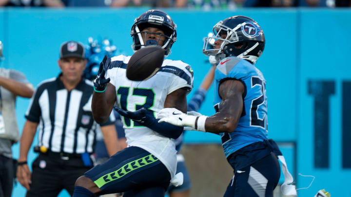 Seattle Seahawks wide receiver Easop Winston Jr. (13) hauls in a touchdown pass ahead of Tennessee Titans cornerback Tre Avery (23) during their game at Nissan Stadium in Nashvillet, Tenn., Saturday, Aug. 17, 2024. Seattle Seahawks wide receiver Easop Winston Jr. (13) hauls in a touchdown pass ahead of Tennessee Titans cornerback Tre Avery (23) during their game at Nissan Stadium in Nashvillet, Tenn., Saturday, Aug. 17, 2024.