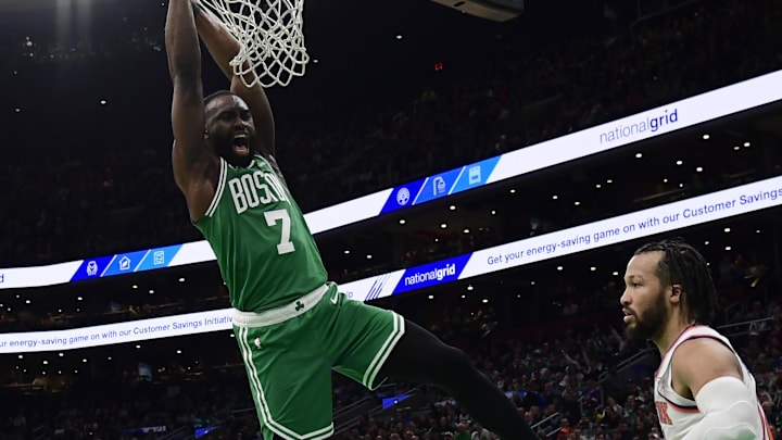 Feb 23, 2025; Boston, Massachusetts, USA; Boston Celtics guard Jaylen Brown (7) reacts after dunking the ball during the second half against the New York Knicks at TD Garden. Mandatory Credit: Bob DeChiara-Imagn Images