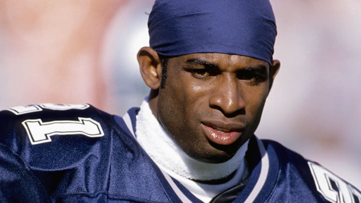 Oct 27, 1996; Miami, FL, USA; FILE PHOTO; Dallas Cowboys receiver Deion Sanders on the sideline against the Miami Dolphins at Dolphin Stadium. Mandatory Credit: Imagn Images