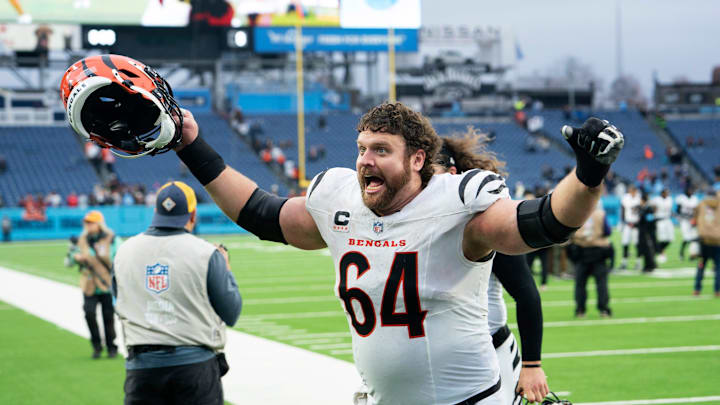 Cincinnati Bengals center Ted Karras (64) celebrates after the game against the Tennessee Titans at Nissan Stadium in Nashville, Tenn., Sunday, Dec. 15, 2024.