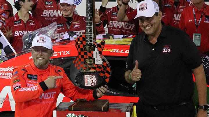 Justin Allgaier poses in victory lane with his Gibson Guitar, which is the customary trophy for wins at Nashville Superspeedway. Justin Allgaier poses in victory lane with his Gibson Guitar, which is the customary trophy for wins at Nashville Superspeedway.