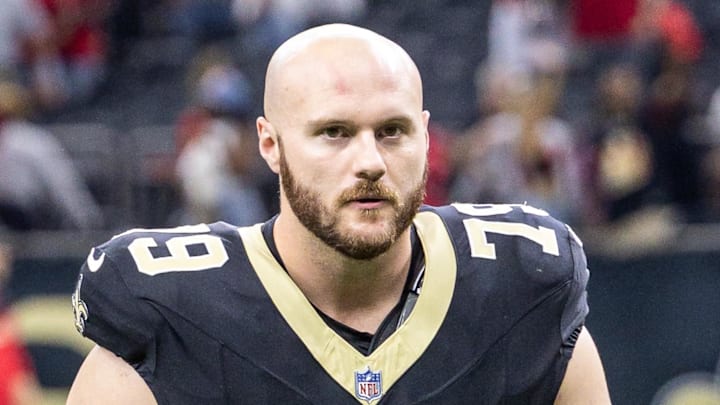 Sep 14, 2025; New Orleans, Louisiana, USA;  New Orleans Saints guard Luke Fortner (79) heads off the field after the game against the San Francisco 49ers at Caesars Superdome. Mandatory Credit: Stephen Lew-Imagn Images