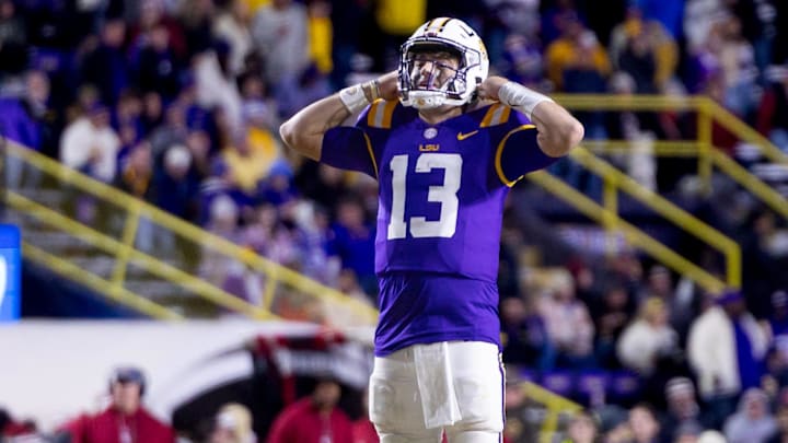 Nov 30, 2024; Baton Rouge, Louisiana, USA;  LSU Tigers quarterback Garrett Nussmeier (13) reacts to missing a pass against the Oklahoma Sooners during the fourth quarter at Tiger Stadium. Mandatory Credit: Stephen Lew-Imagn Images