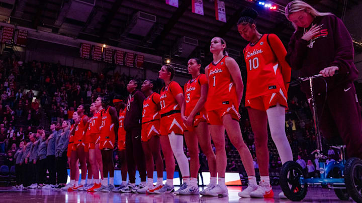 Virginia Tech women's basketball team during the national anthem.